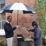 David Watt and Yenti prepare the satays for an amazing Malaysian feast